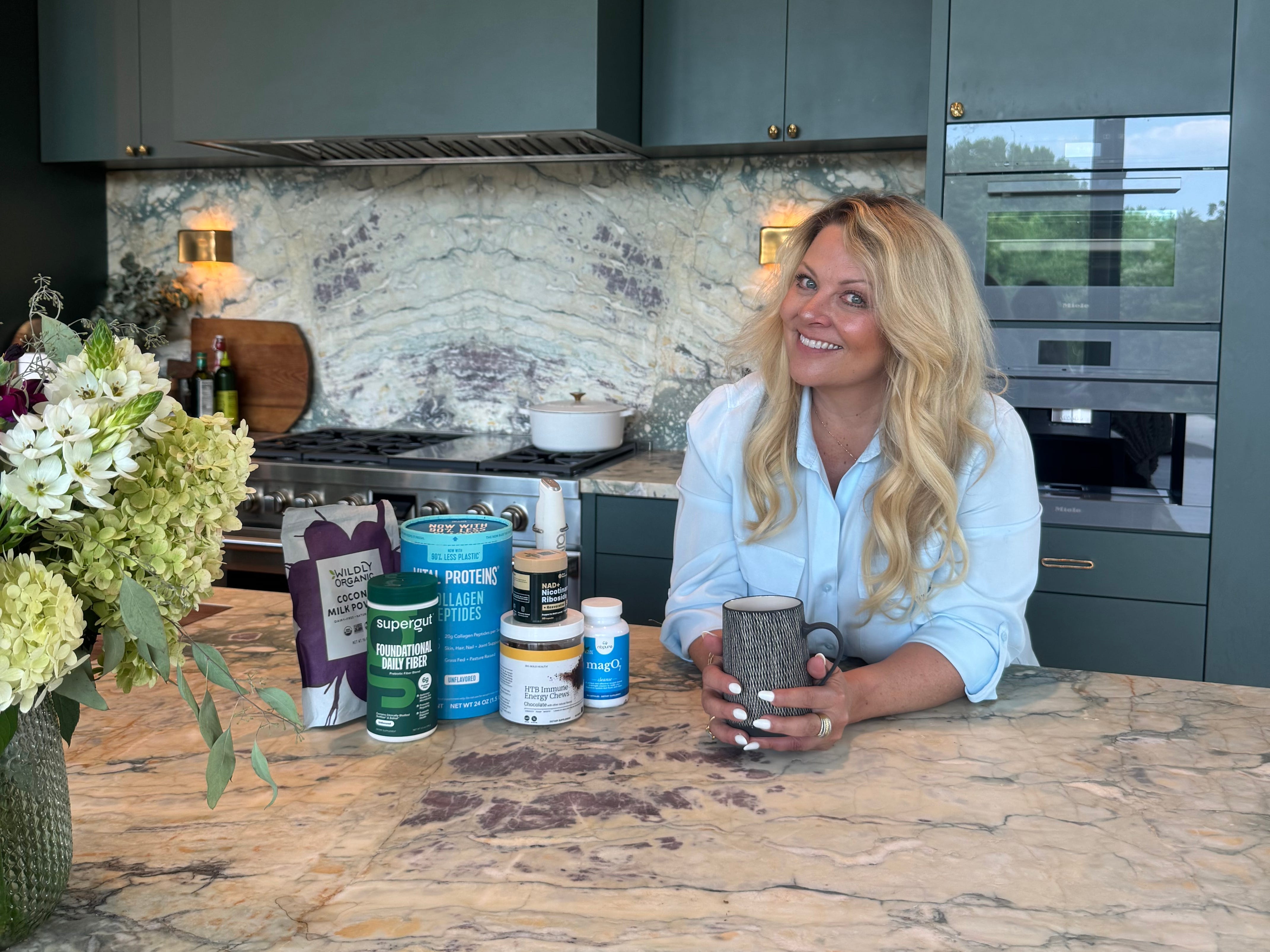 Tracey Halama, CEO of Supergut, poses with her supplements.