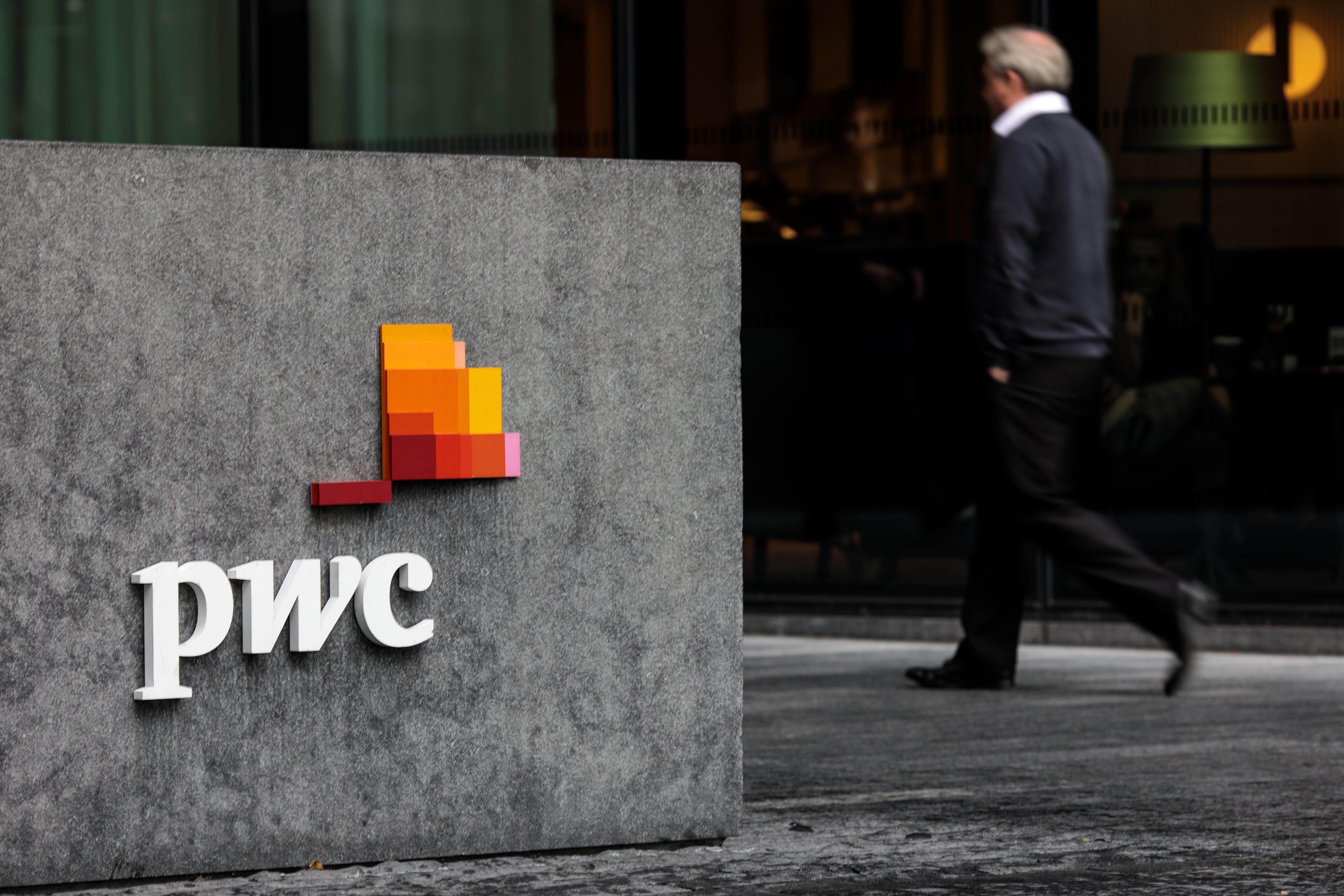 PwC logo outside office at More London location
