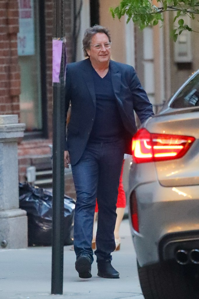 Philip Falcone walking in New York City.