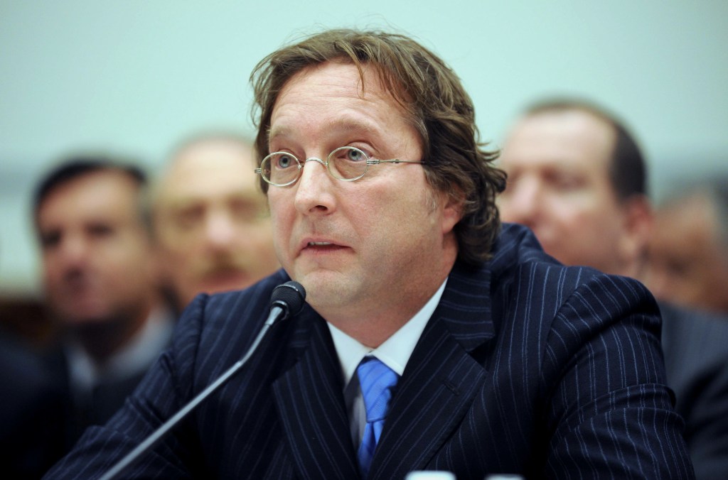 Philip Falcone testifying before a committee.