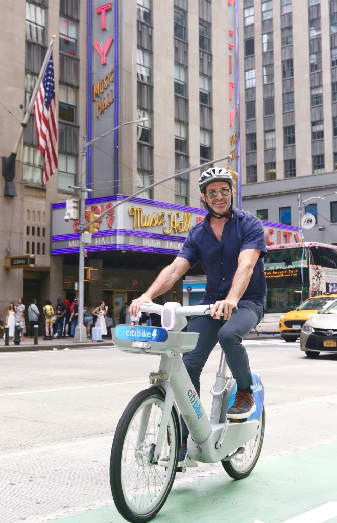 Hugh Jackman hops a CitiBike to  his recent “From New York, With Love” show   at Radio City.