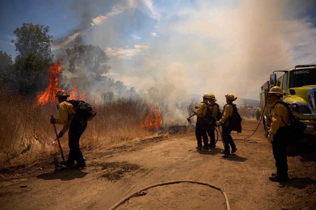 Firefighters battling a wildfire in Los Angeles.