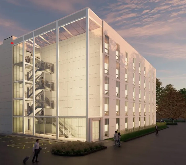 Manhattan-based Vessel Technologies is warning officials in Bethel, Conn., that they face expensive litigation if they reject the company's five-story, 75-unit apartment complex.