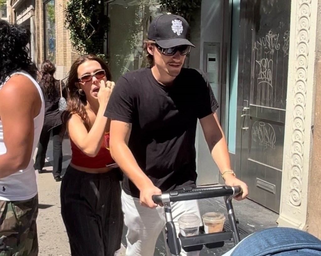 Millie Bobby Brown and Jake Bongiovi take their adopted baby out for a stroll on Prince St. in SOHO.