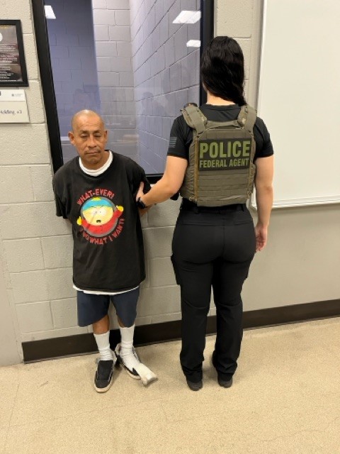 ICE agent arresting Diego Hernandez.