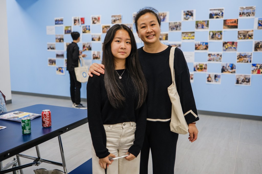 Minqi Zhou and her mother at the opening of MESA South Brooklyn charter high school.