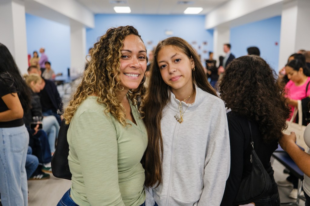 Michelle Perez and her daughter Amber Saran at the opening of MESA South Brooklyn charter high school.