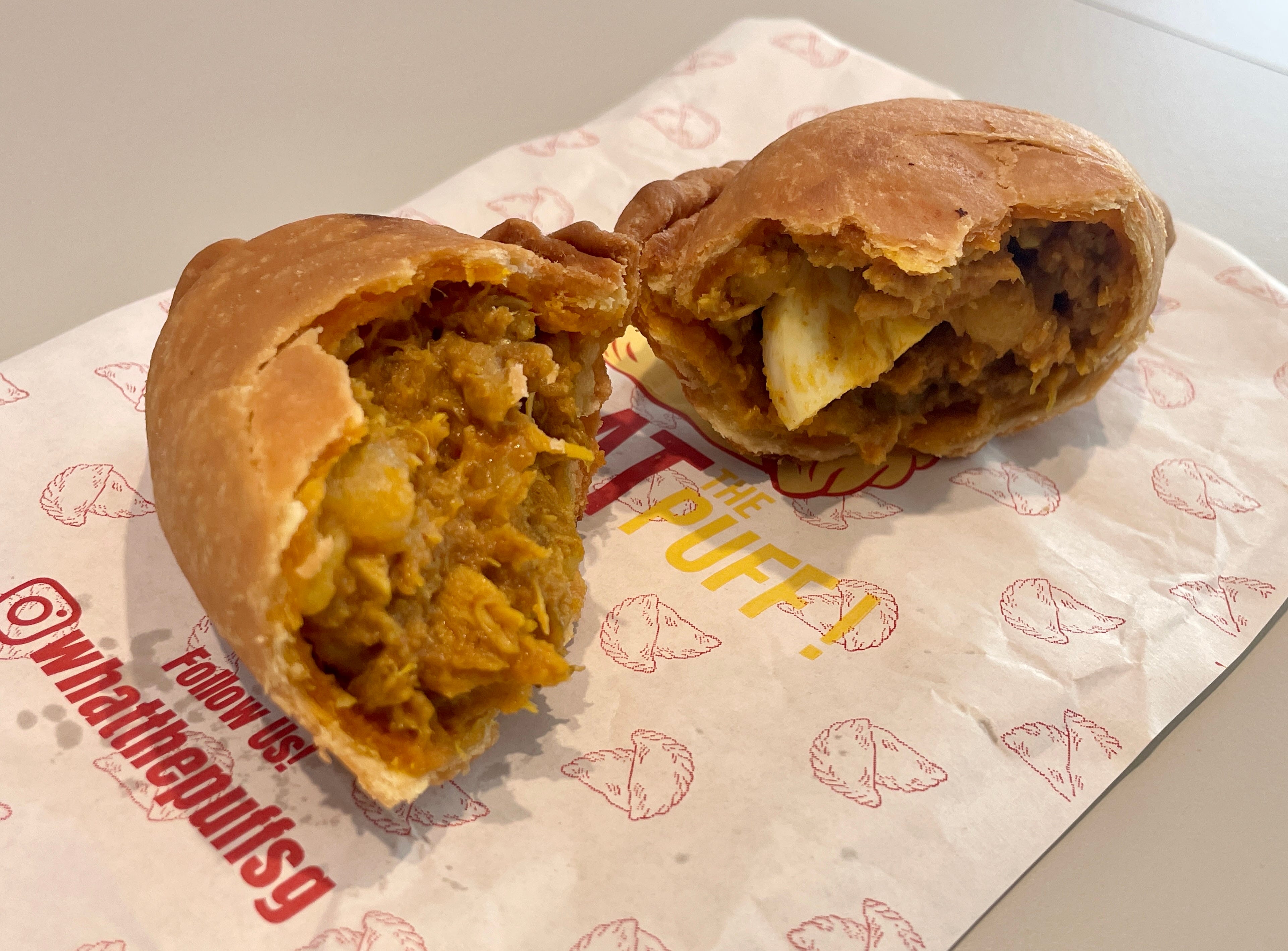 The freshly fried puff was filled with a potato, chicken, and egg curry mix and had a buttery and flaky crust.