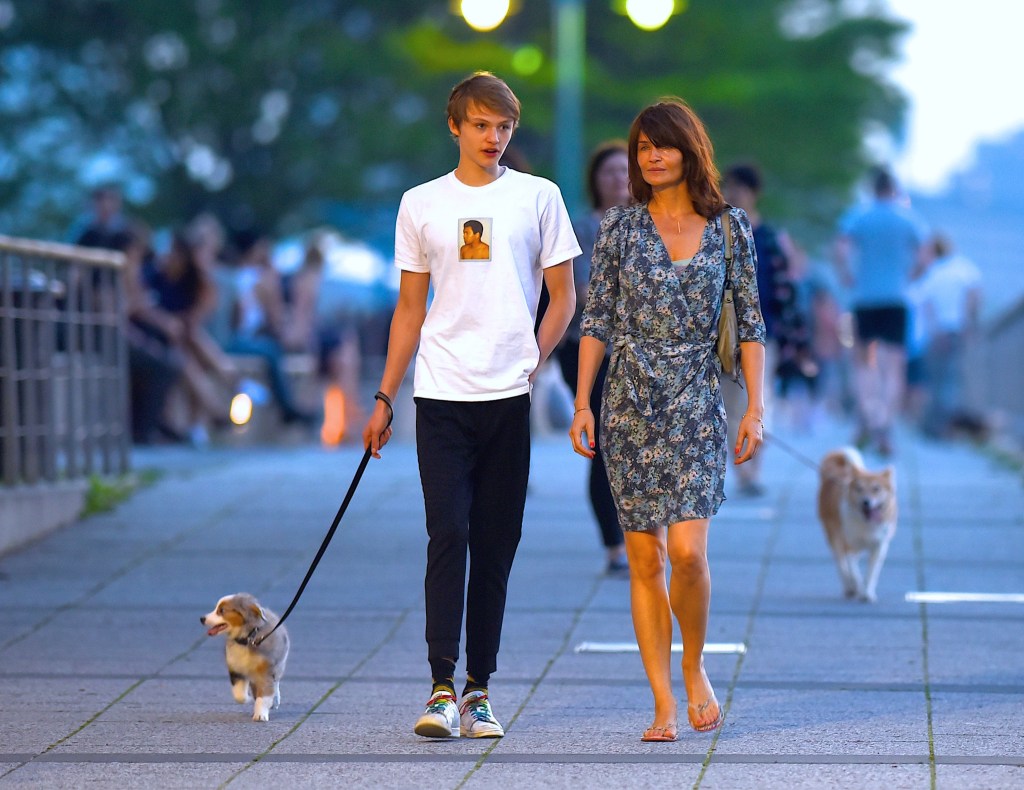 Helena Christensen and her son, Mingus, walking their dog in 2016.