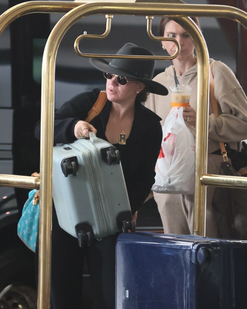 Kelly Clarkson at LAX after the death of her ex-husband, Brandon Blackstock.
