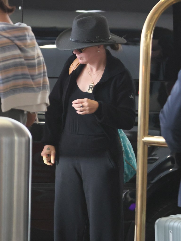 Kelly Clarkson at LAX after the death of her ex-husband, Brandon Blackstock.