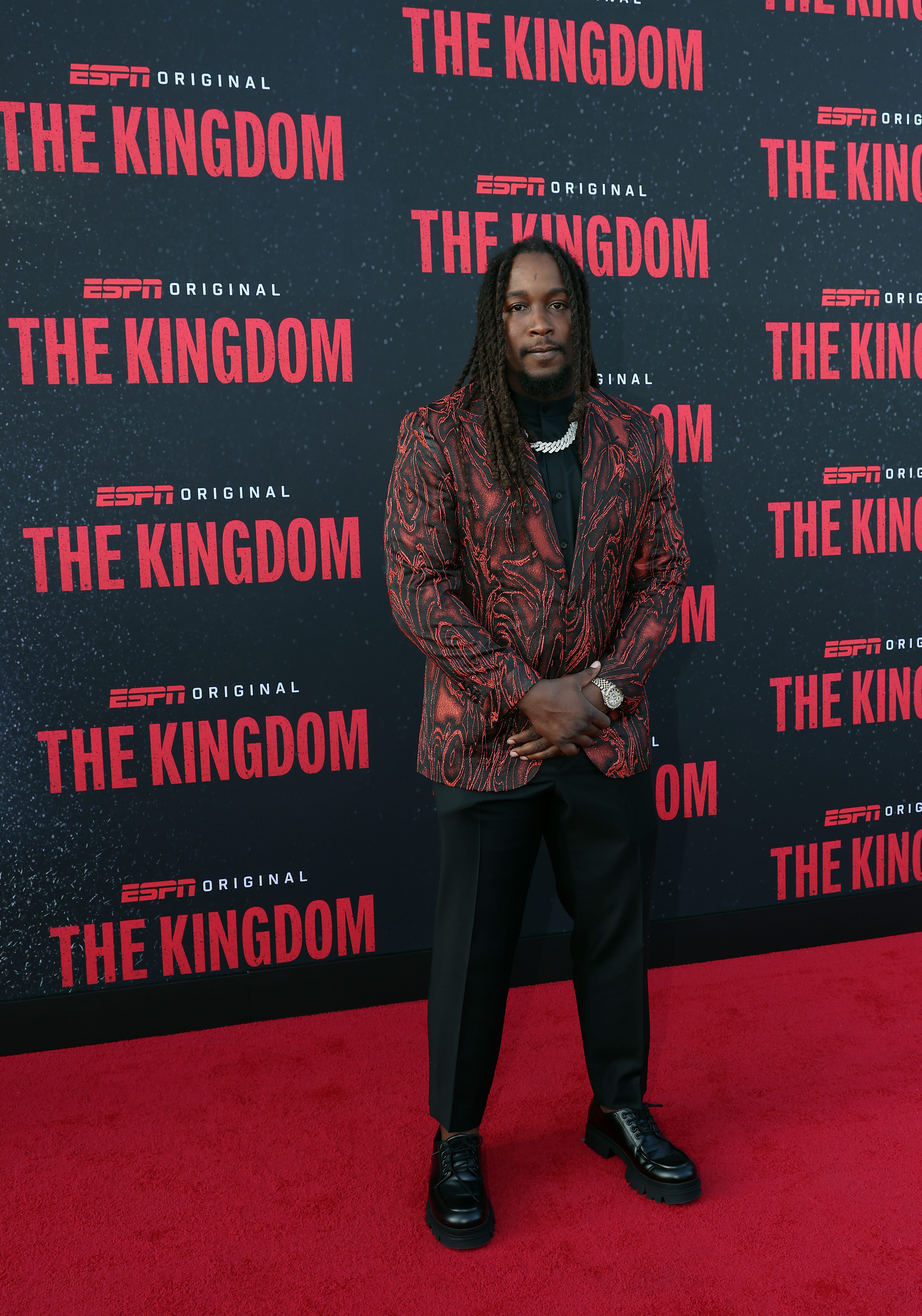 Kareem Hunt poses on the red carpet for a screening of "The Kingdom."