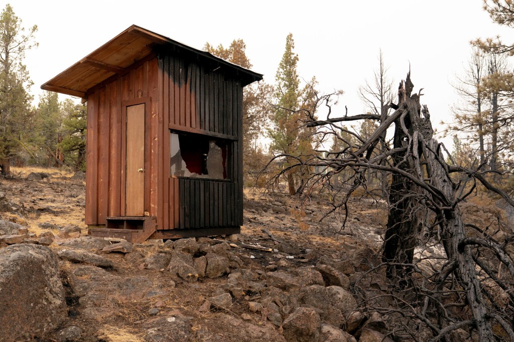 Burned sauna after the Flat Fire near Sisters, Oregon.