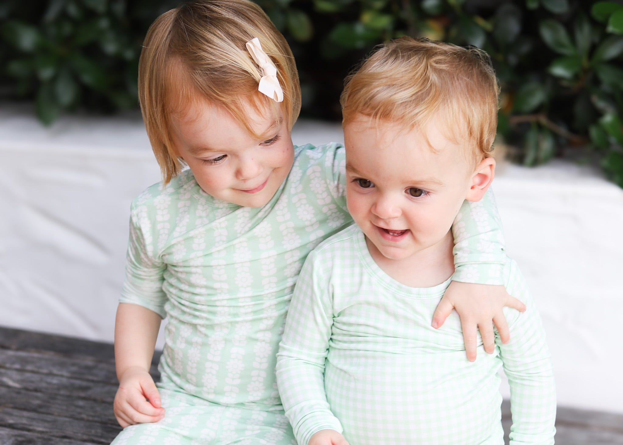 Samantha Gold's children wearing light green pajamas from Motette