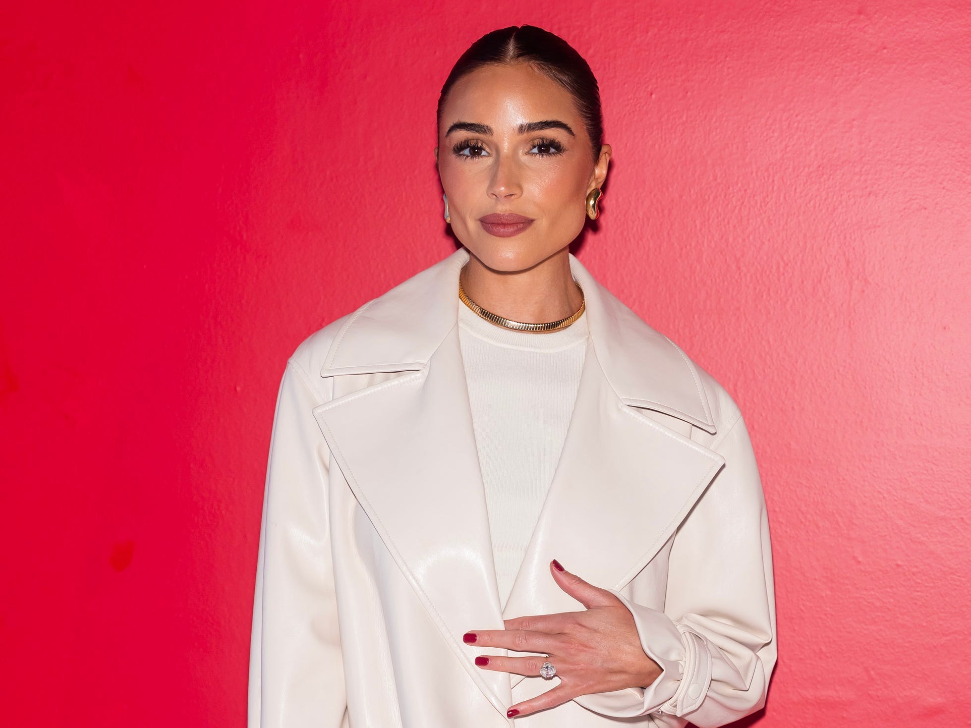 Olivia Culpo posed at the alice + olivia by Stacy Bendet presentation at New York Fashion Week in 2024.