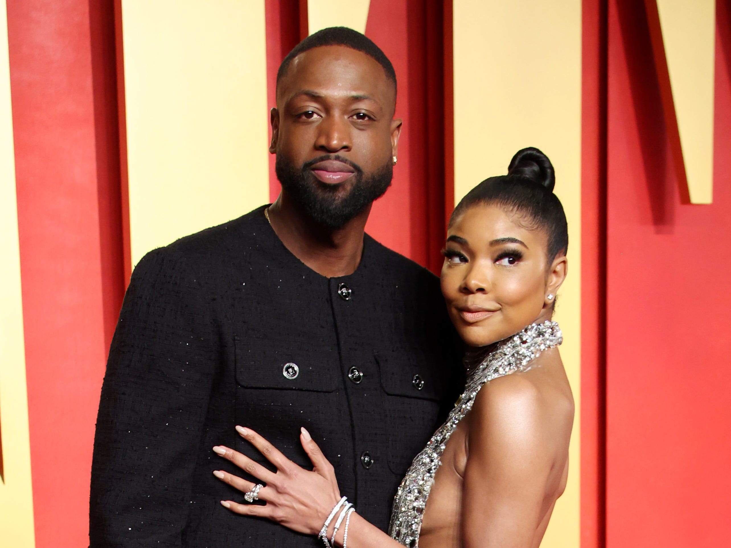 Dwyane Wade and Gabrielle Union posed at the 2024 Vanity Fair Oscars Party.