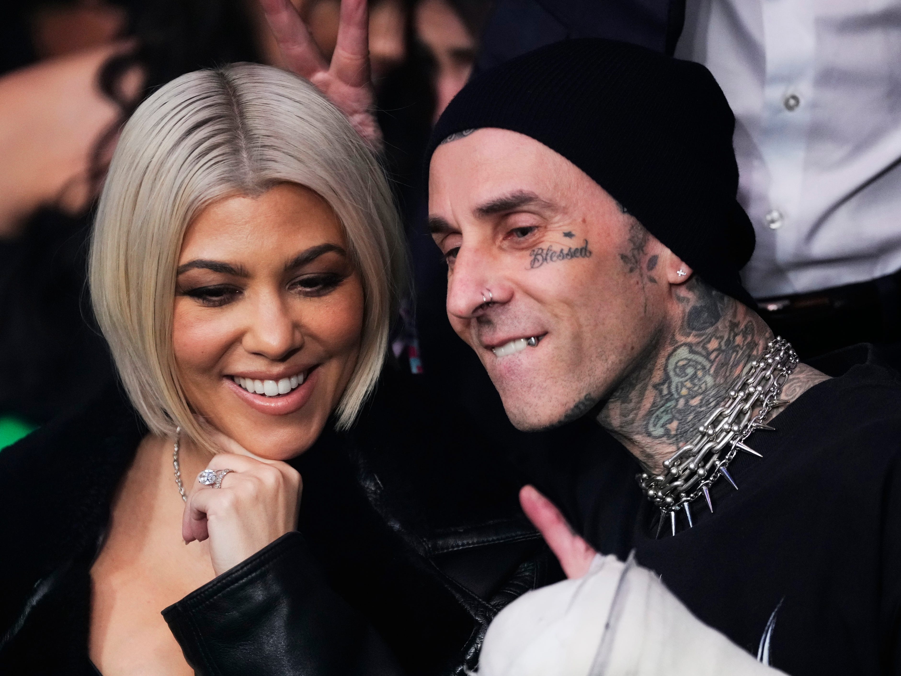 Kourtney Kardashian and Travis Barker at the UFC 285 event in 2023.