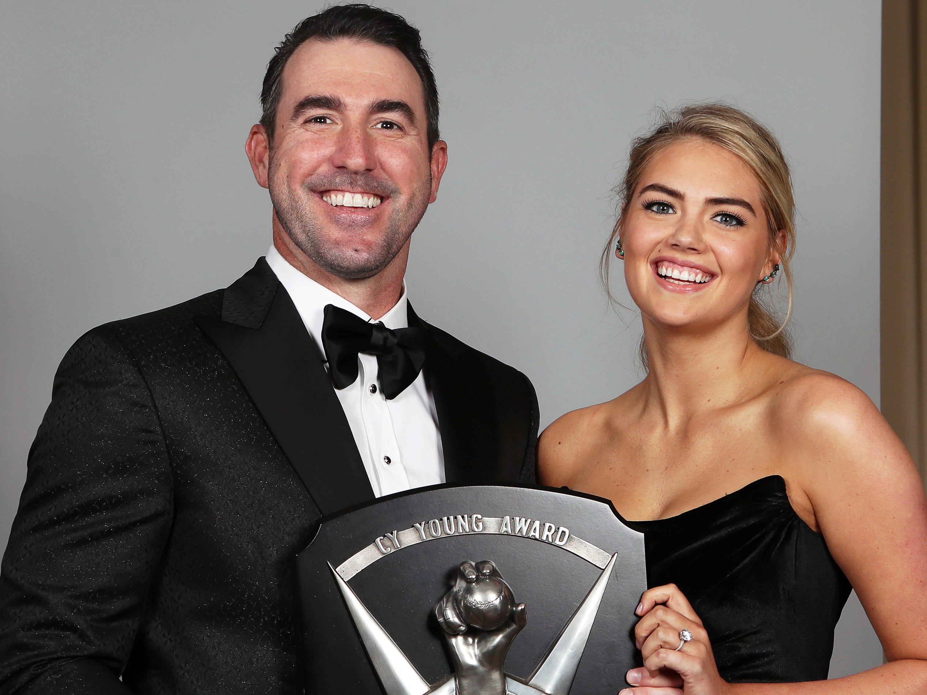 Justin Verlander and Kate Upton posed with his 2019 Cy Young Award at the 2020 Baseball Writers' Association of America Awards Dinner.