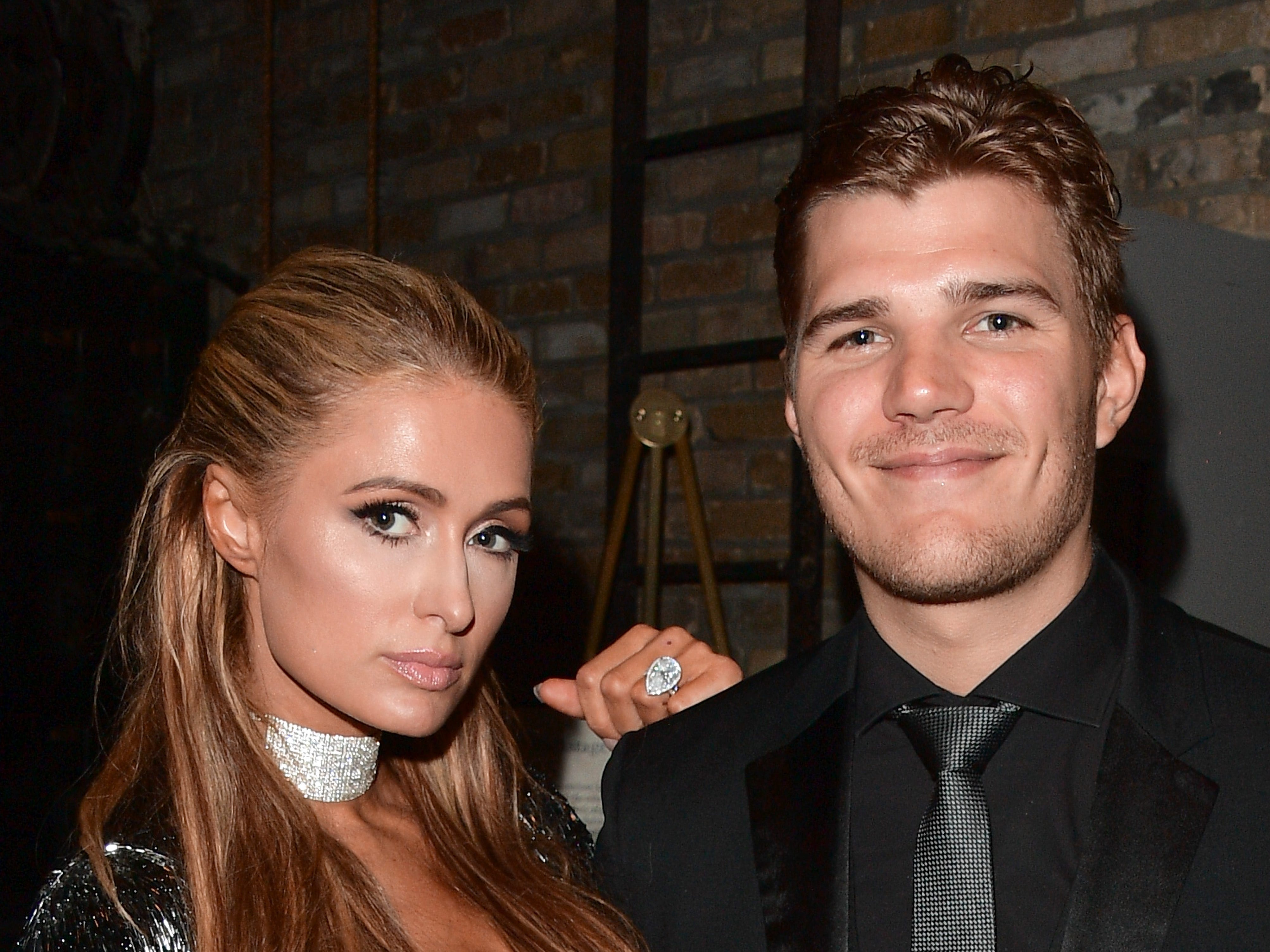 Paris Hilton and Chris Zylka posed at the premiere of "The Death and Life of John F. Donovan" at the 2018 Toronto Film Festival.