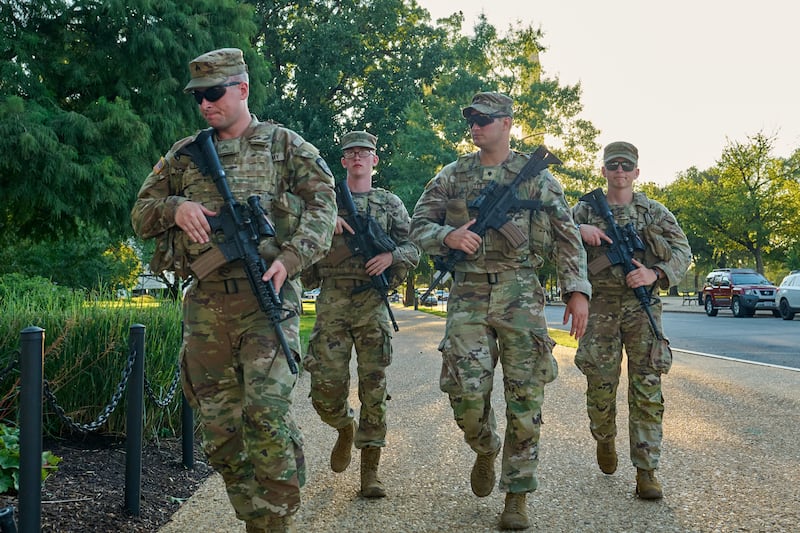 Members of the National Guard from multiple states patrol the National Mall in Washington D.C. on August 25, 2025 on orders from President Donald Trump.