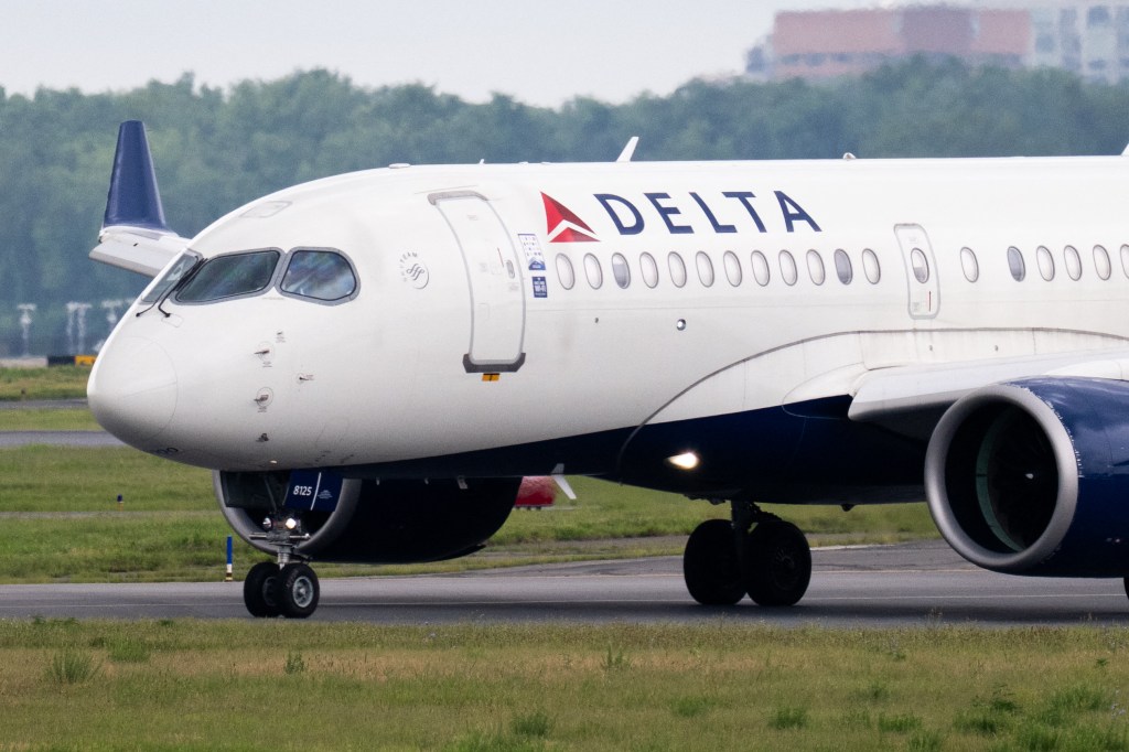 Delta Air Lines Airbus A220 preparing for takeoff.