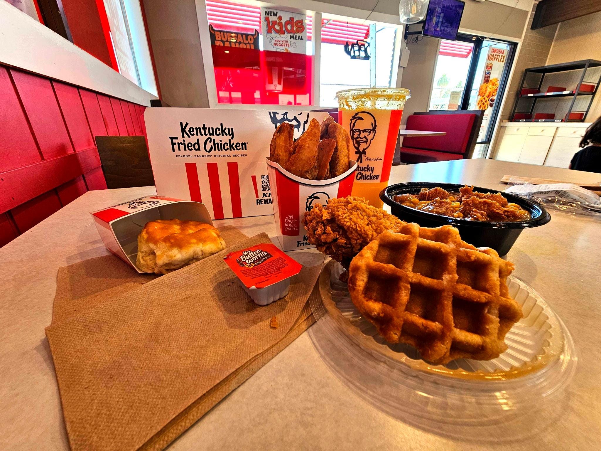 A meal of KFC chicken on a table inside one of the chain's restaurants.