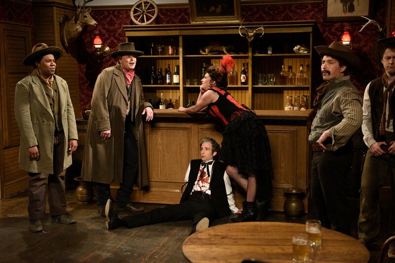 SNL host Elon Musk with Kenan Thompson, Kyle Mooney, Cecily Strong, Beck Bennett, and Alex Moffat during the "Cowboy Standoff" sketch on Saturday, May 8, 2021.