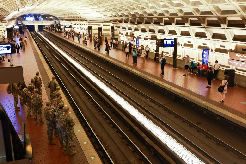 National Guard troops patrolling a Washington, D.C. metro station.