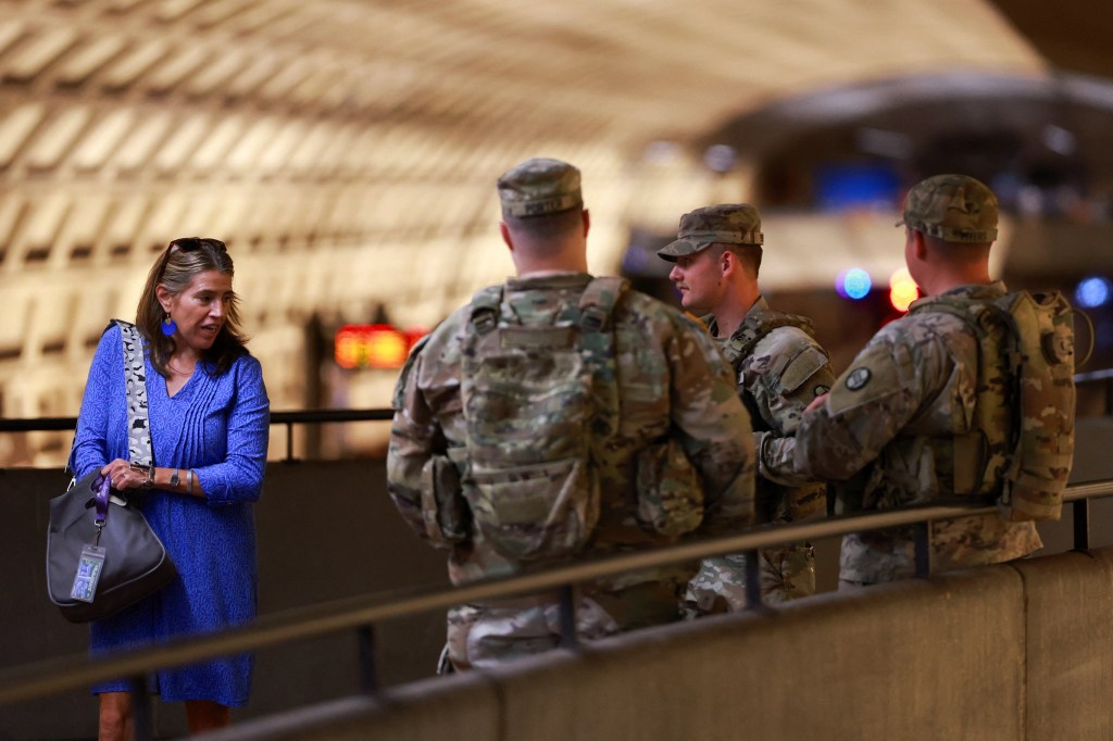 South Carolina National Guard members patrol a D.C. subway station.