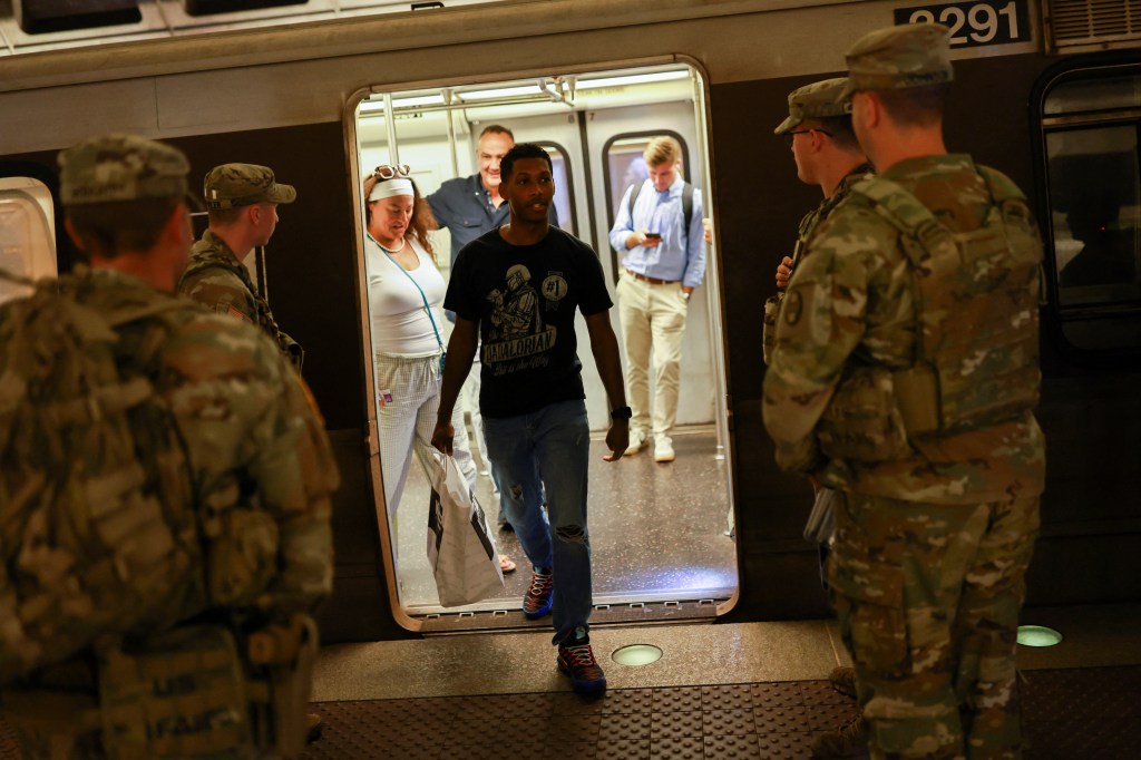 National Guard members patrol a Washington, D.C. metro station.