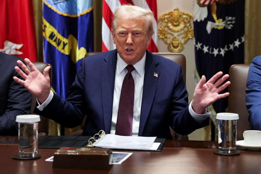 President Donald Trump gestures during a cabinet meeting at the White House in Washington, D.C., U.S., August 26, 2025.