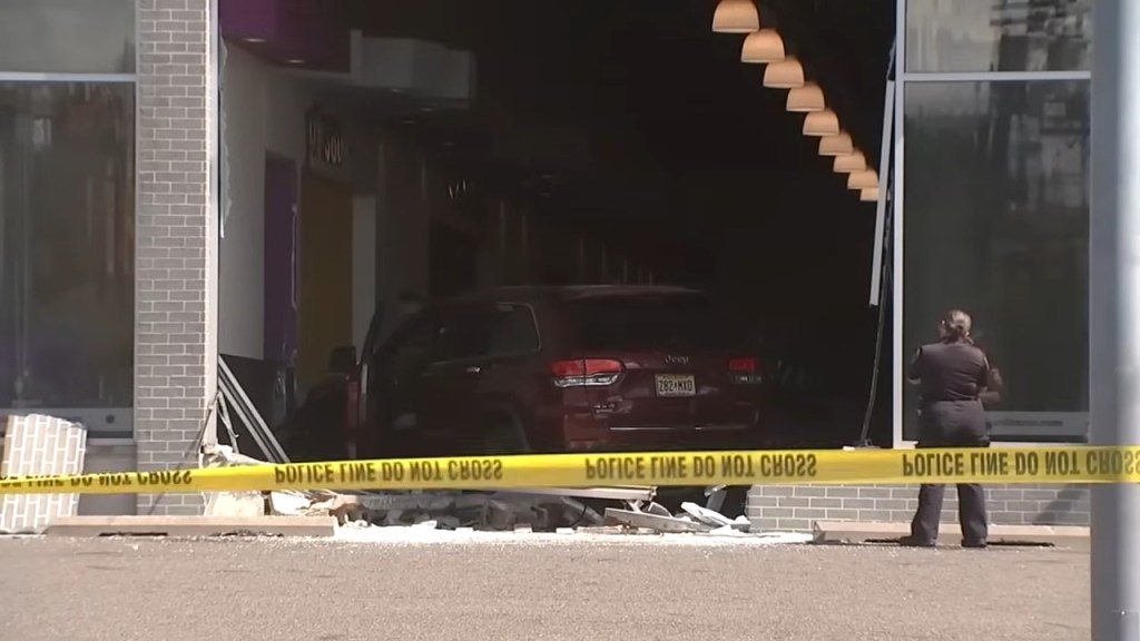 Car crashed into a Planet Fitness gym.