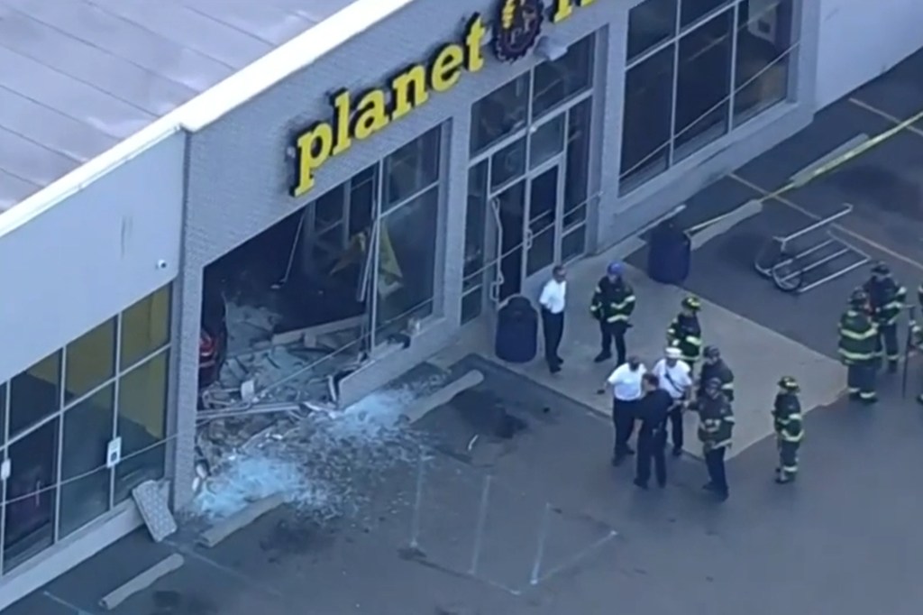 Car crashed into Planet Fitness, causing damage and injuries.