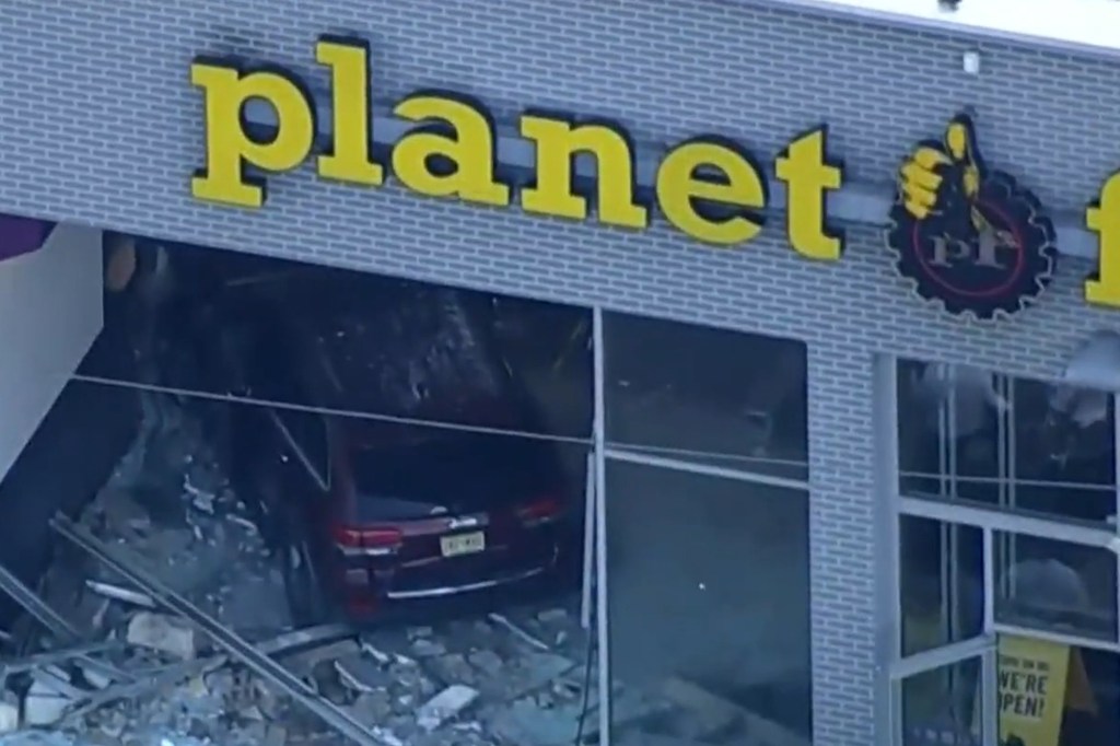 SUV crashed into a Planet Fitness gym.