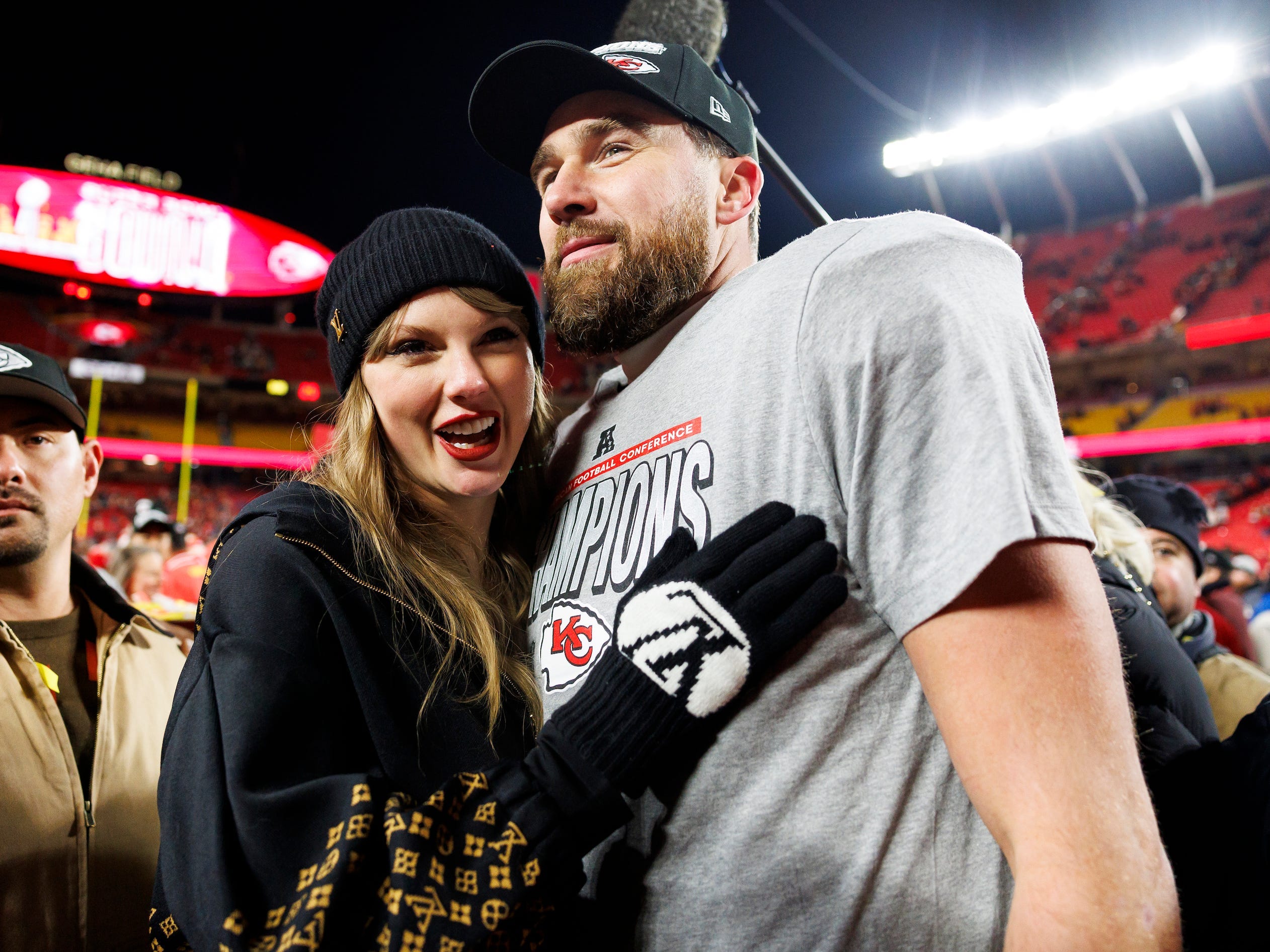 Taylor Swift and Travis Kelce embrace after the Kansas City Chiefs victory on January 26.