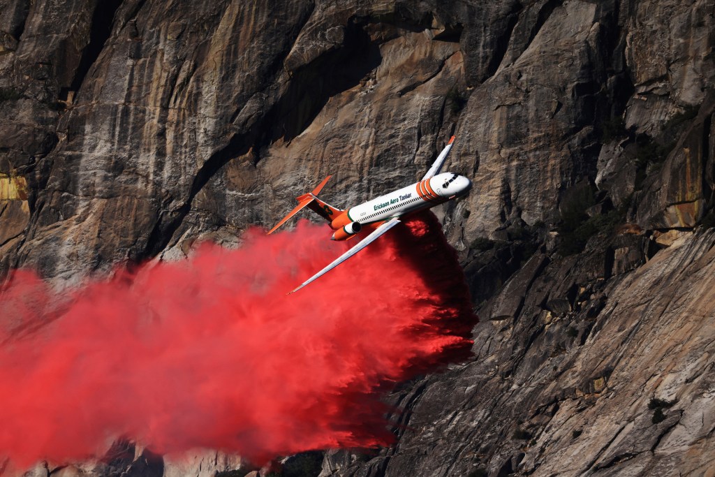 Air tanker dropping fire retardant on the Garnet Fire in California.