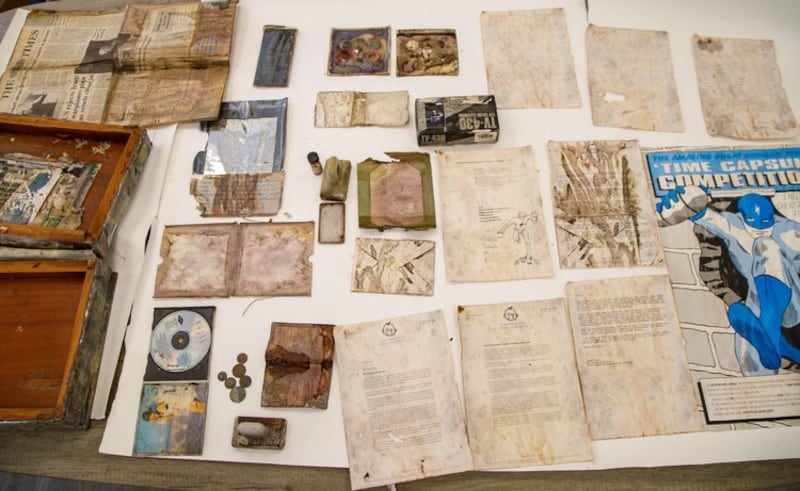 A portable TV, a Kylie Minogue CD and a picture of Diana were among the items buried.