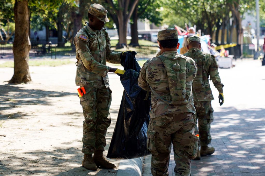 National Guard members picking up litter in Lafayette Park, Washington, D.C.