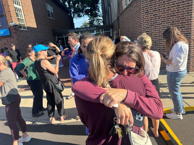 Parents await news of their children's status after shooting at Annunciation Church on Wednesday morning, Aug. 27, 2025 in Minneapolis.