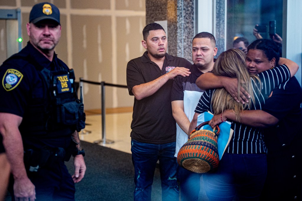Kilmar Abrego Garcia and family at an ICE office after his release from jail.