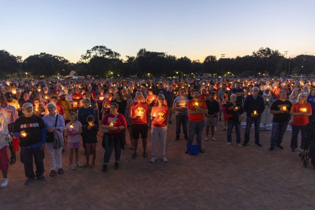 Candlelight vigil for victims of Minneapolis Catholic school shooting.