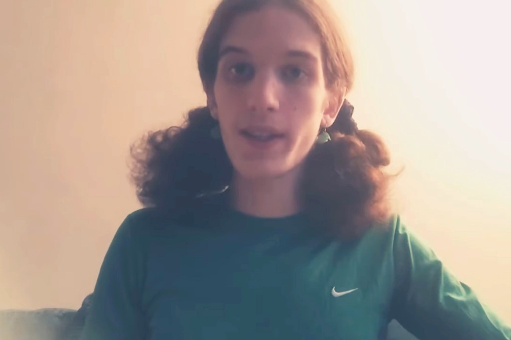 Video still of Robin Westman reading aloud.
