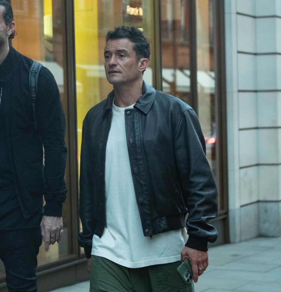 Orlando Bloom walking to dinner.