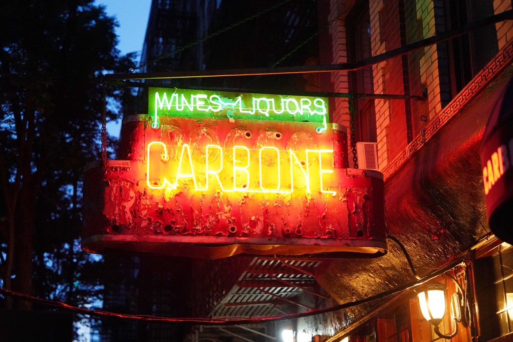 Neon sign for Carbone, Wines & Liquors.