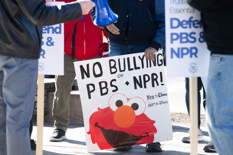 People participate in a rally to call on Congress to protect funding for US public broadcasters, Public Broadcasting Service (PBS) and National Public Radio (NPR), outside the NPR headquarters in Washington, DC, on March 26, 2025. President Donald Trump said on March 25 that he would