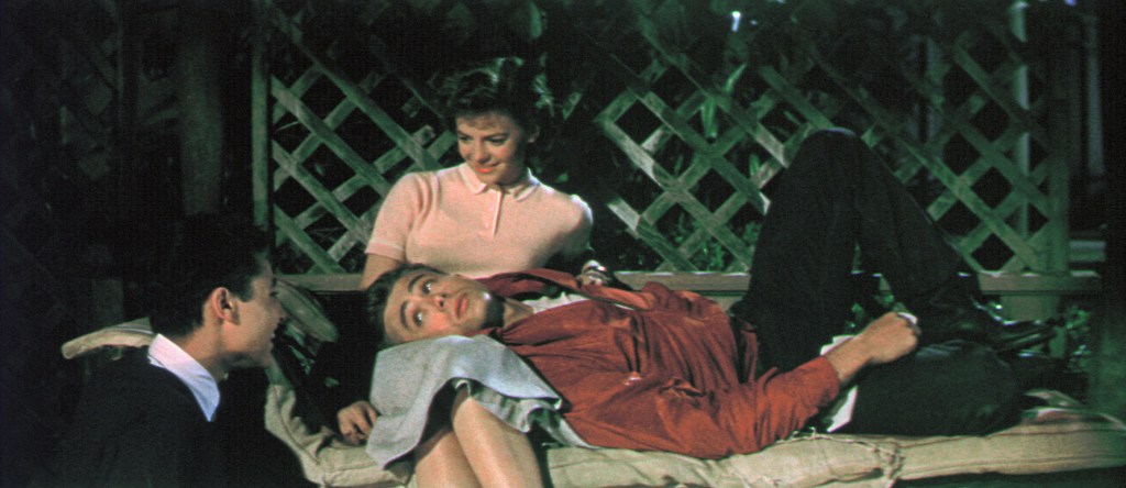 Scene from Rebel Without a Cause: James Dean, Natalie Wood, and Sal Mineo.