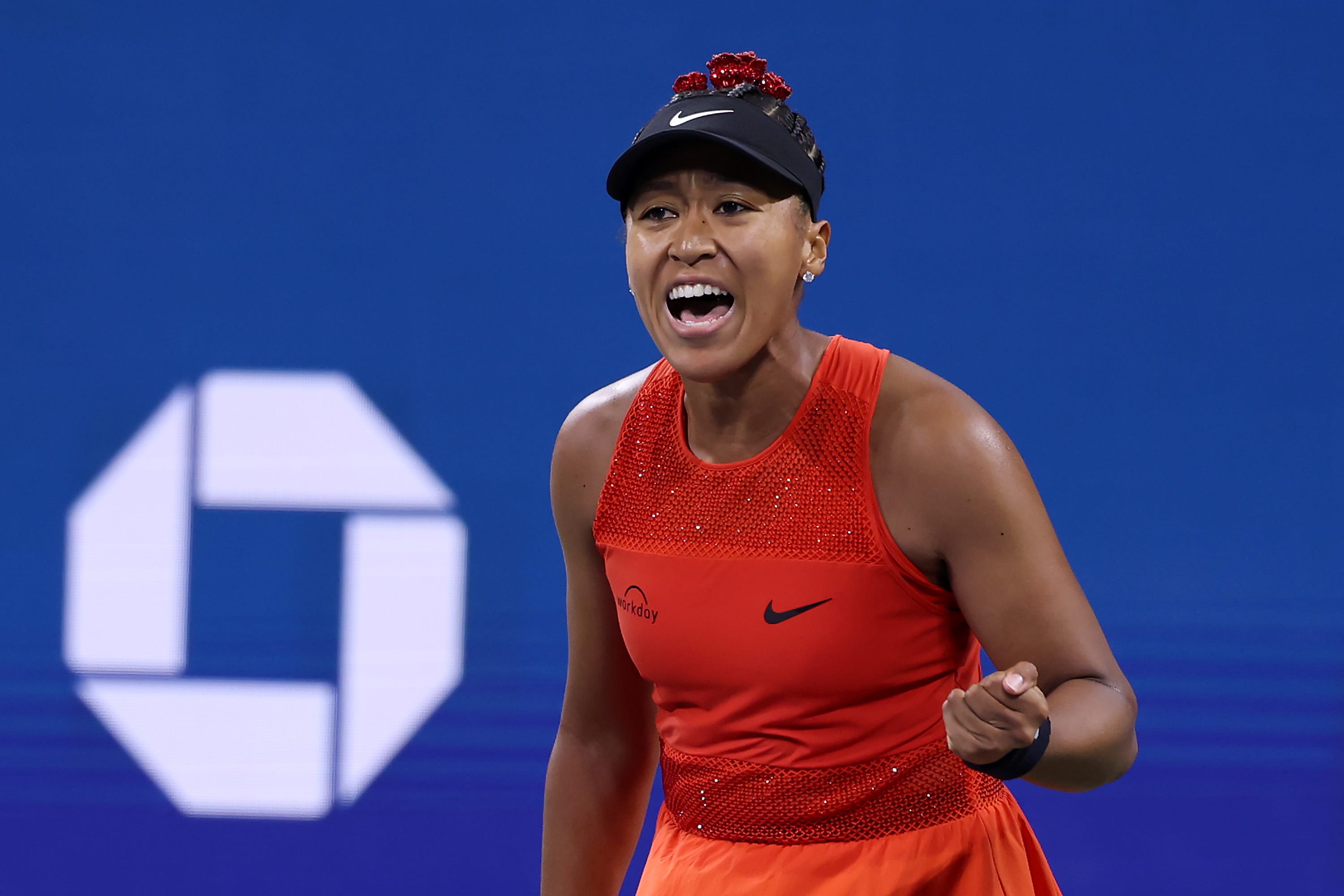 Naomi Osaka of Japan reacts against Greet Minnen of Belgium during their Women's Singles First Round match on Day Three of the 2025 US Open.