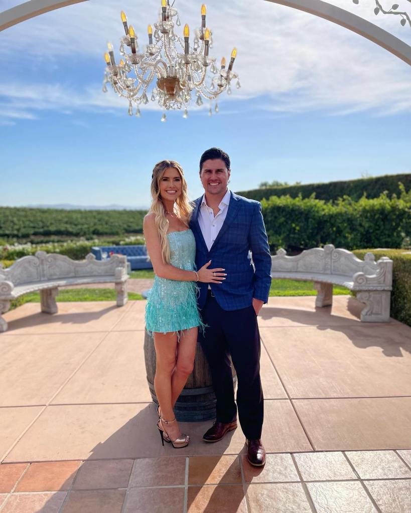 Christina Haack and Josh Hall pose together.