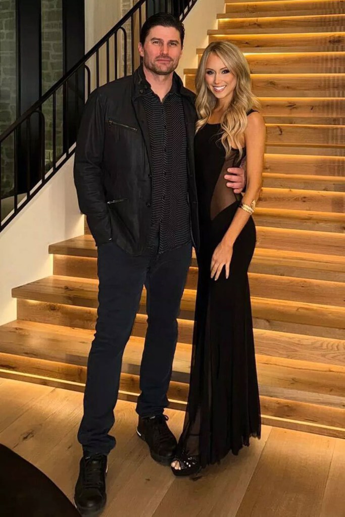 Christina Haack and Josh Hall pose together.