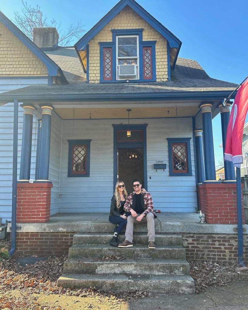 Christina Haack and Josh Hall pose together.